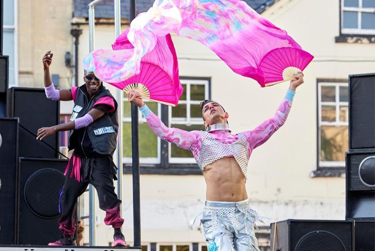 Outdoor artist in pink dancing