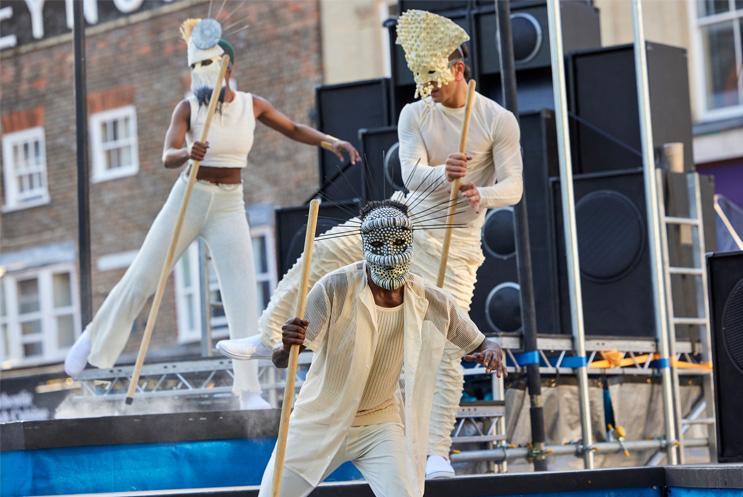 3 outdoor artists in costume