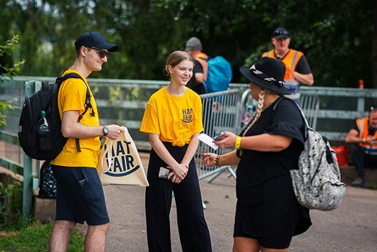 Volunteers helping festival goer