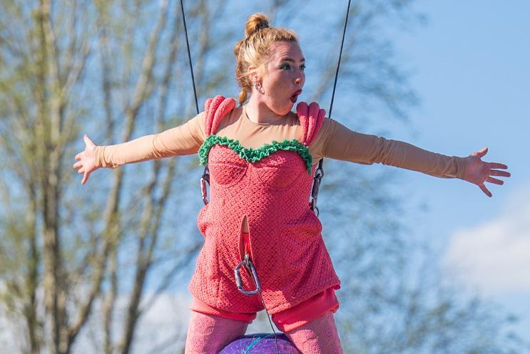 Person in the air with their arms open