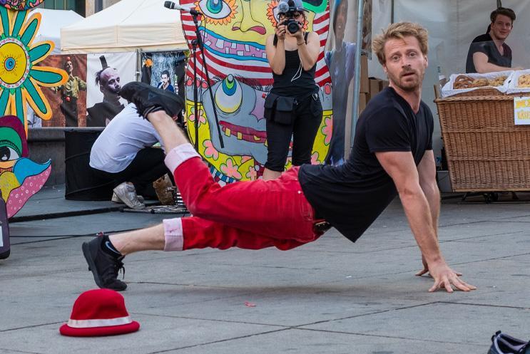 Performer putting on a clown outdoor show