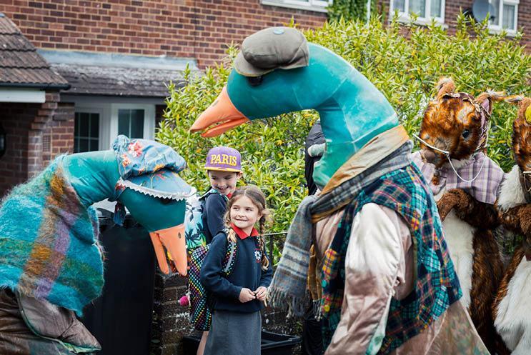 kids talking to ducks